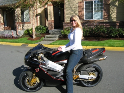 [Photograph of Kim on her Bimota]